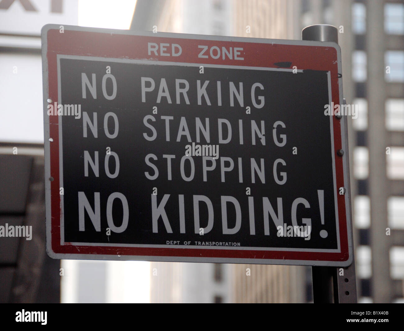 No parking, no standing, no stopping, no kidding Stock Photo