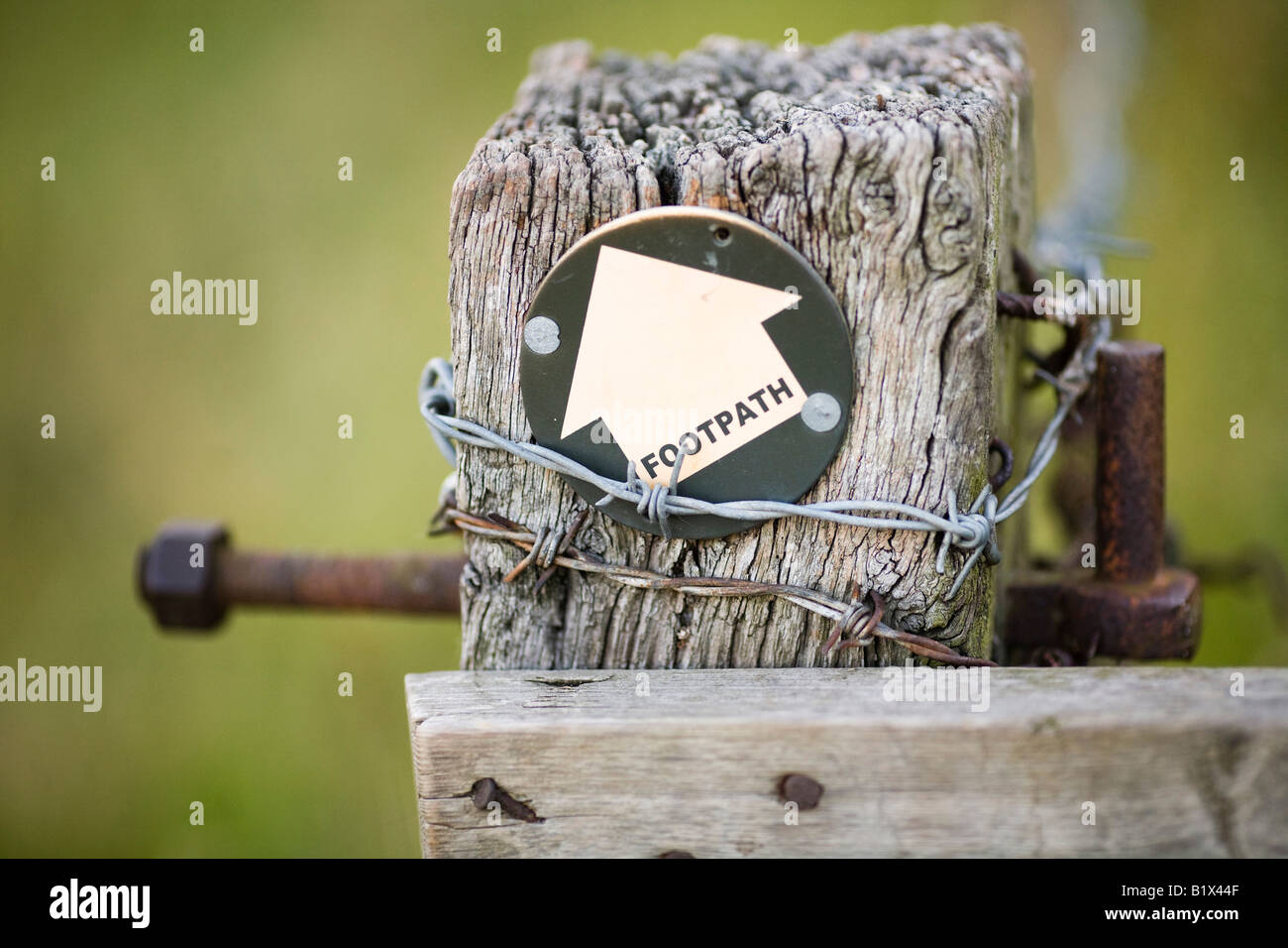 Footpath Blocker A public footpath blocked with barbed wire Stock Photo - Alamy