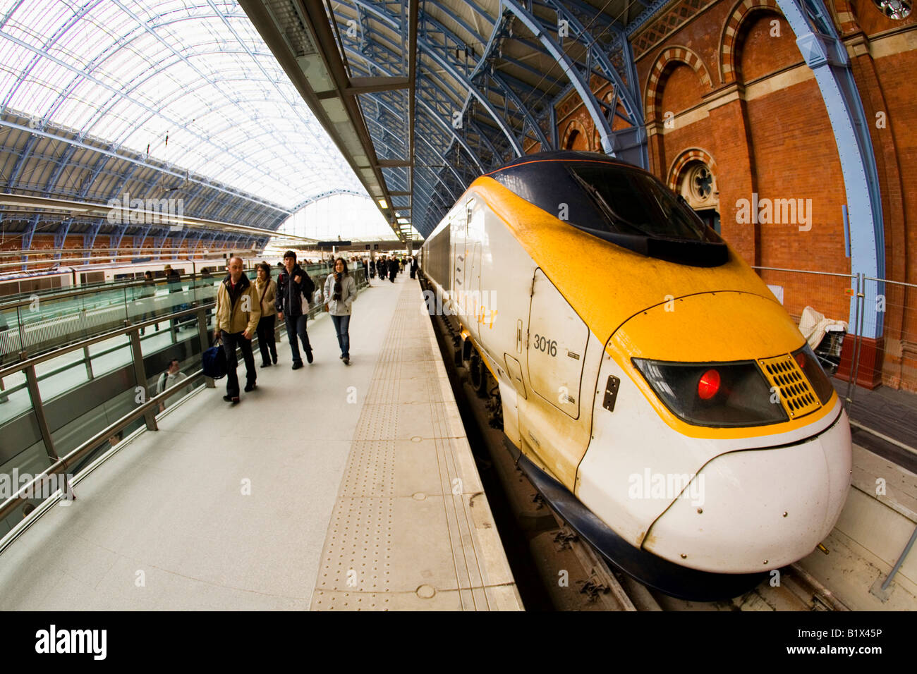 Passengers disembark from Eurostar train on platform at St Pancras Station London England UK United Kingdom GB Stock Photo