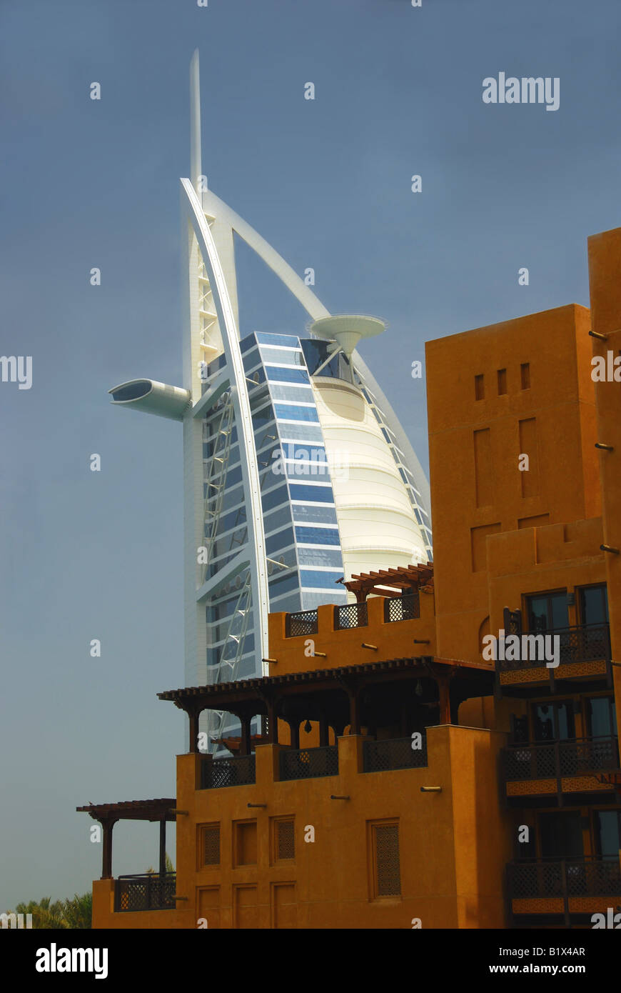 Burj Al Arab hotel with Arabic style buildings in foreground, Dubai ...