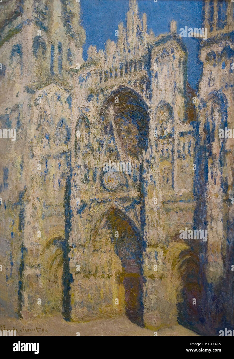 Rouen Cathedral main door and Saint Romain Tower full sun harmony of blue and gold by Claude Monet 1893 Musee D'Orsay Paris Stock Photo