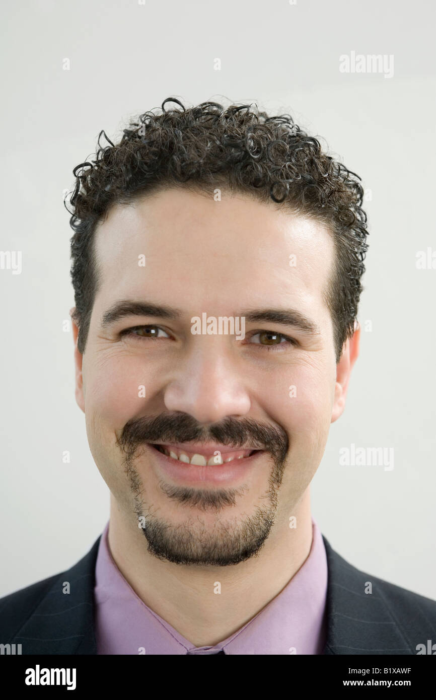 Portrait of a businessman smiling Stock Photo - Alamy