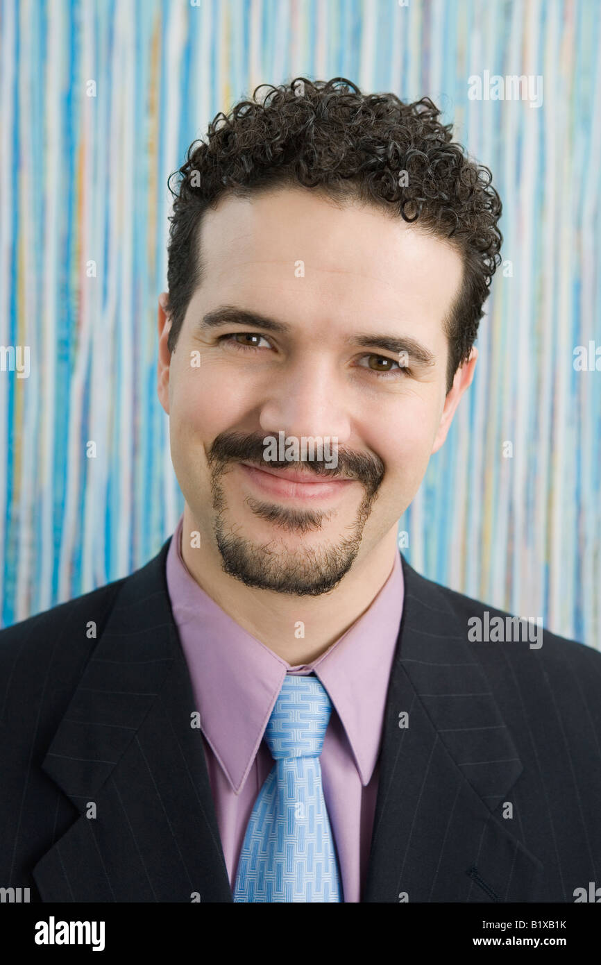 Portrait of a businessman smiling Stock Photo - Alamy