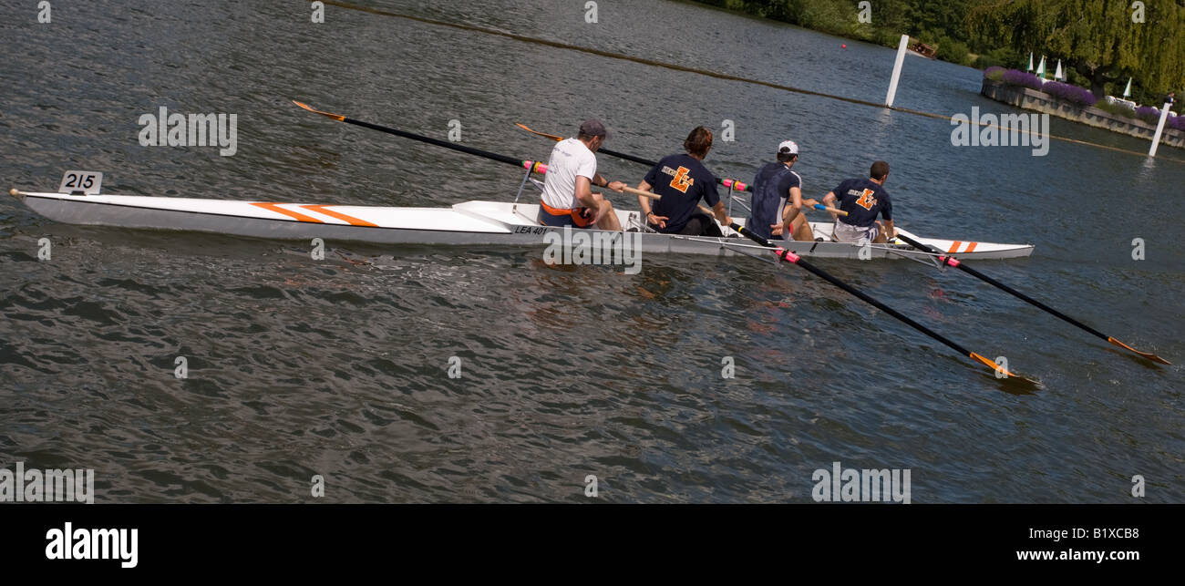 competitive rowers taking part in a race on the River Thames at Henley ...