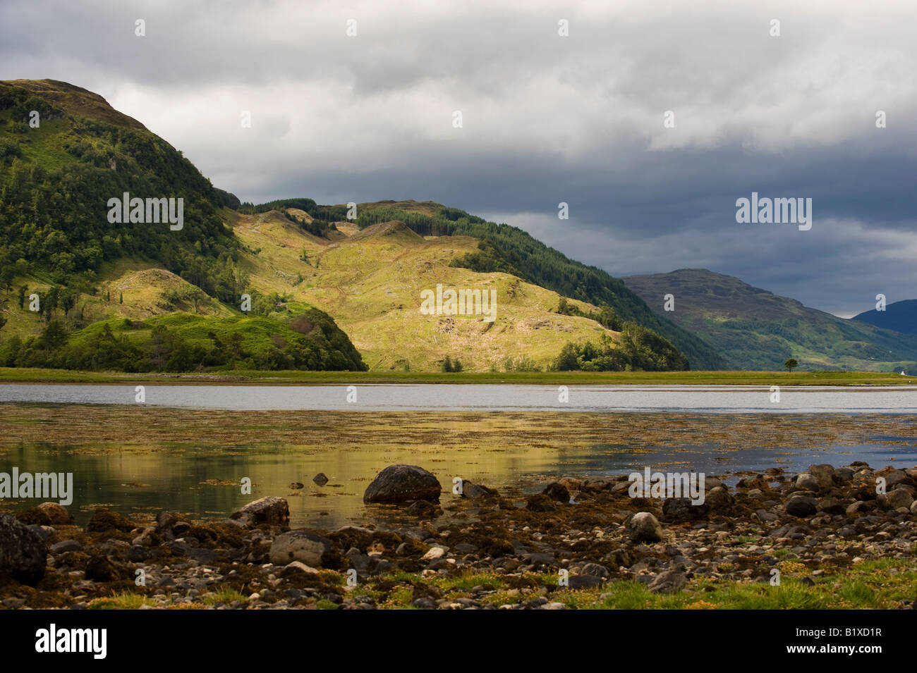 Loch Alsh and reflections. A sea inlet between the isle of Skye in the ...