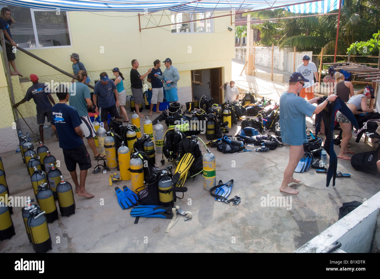 Preparation for a diving trip  in a dive centre. Tofo, Mozambique. Stock Photo