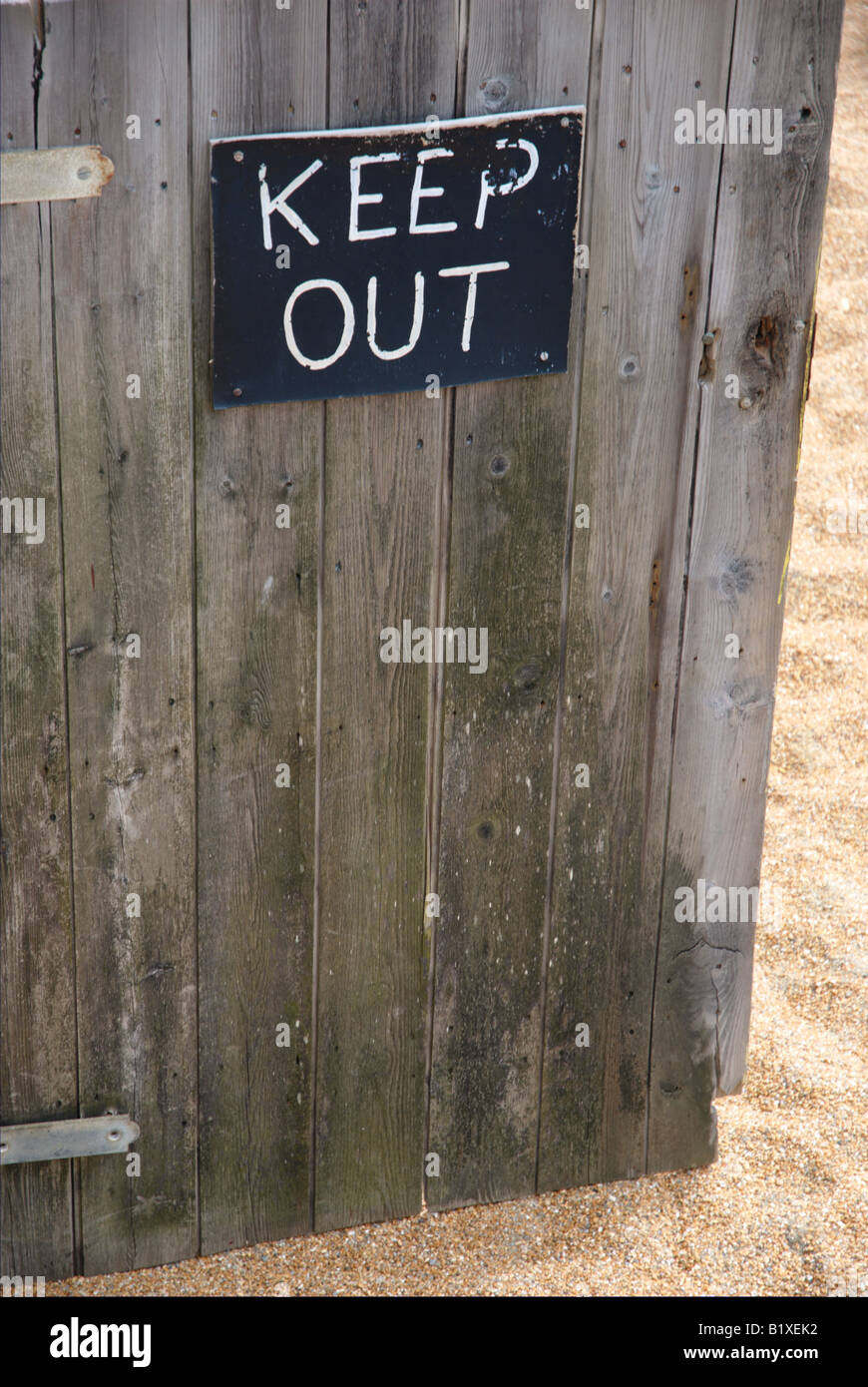 KEEP OUT warning sign on a wooden door Stock Photo Alamy