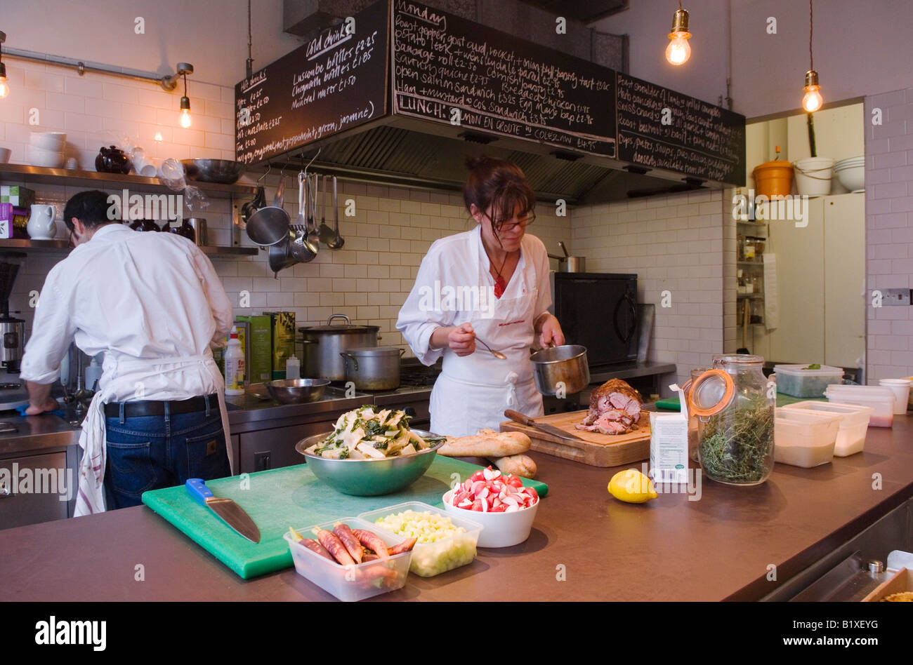 Deli Interior of Melrose and kitchen and counter shop staff London NW1 UK HOMER SYKES