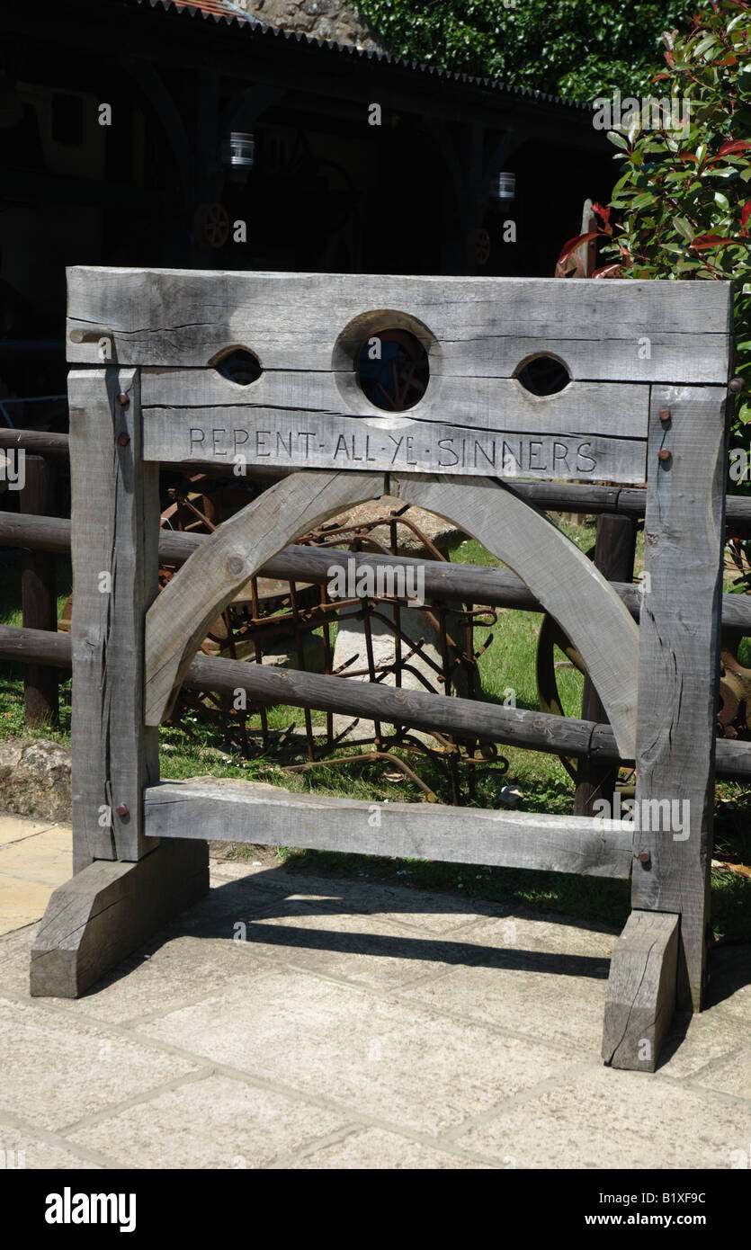 Set of stocks an old fashioned form of punishment Stock Photo - Alamy
