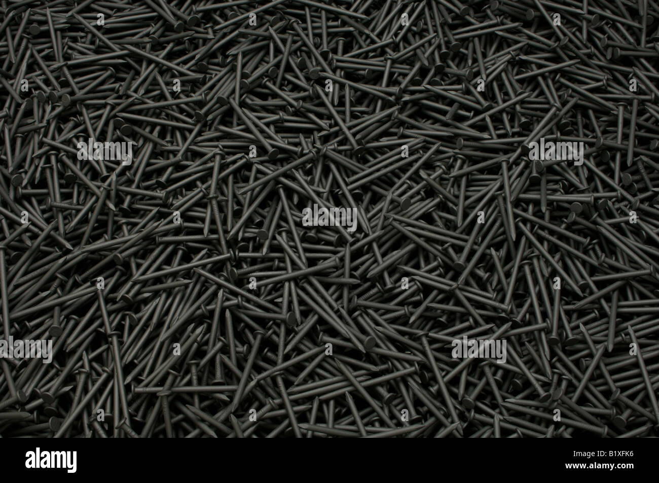 A background of black metal nails Stock Photo Alamy