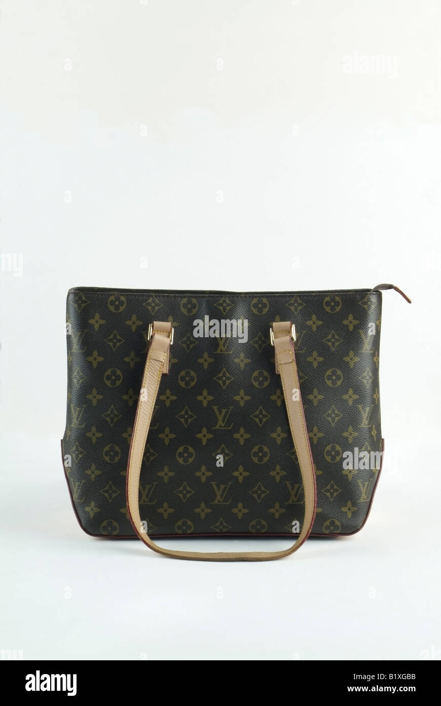 A counterfeit Louis Vuitton women's handbag. Stock Photo