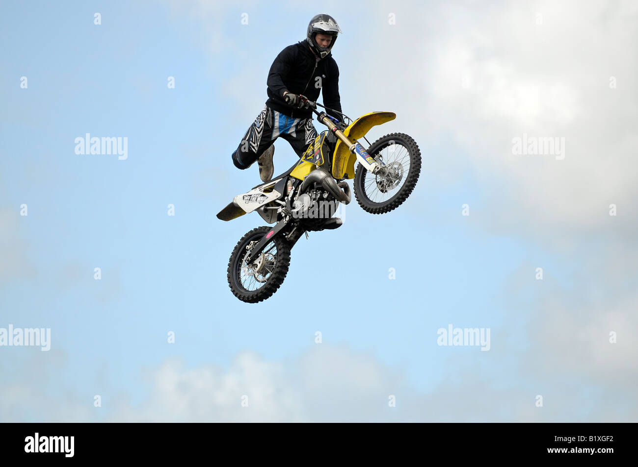 Freestyle motocross stunt rider Stock Photo - Alamy
