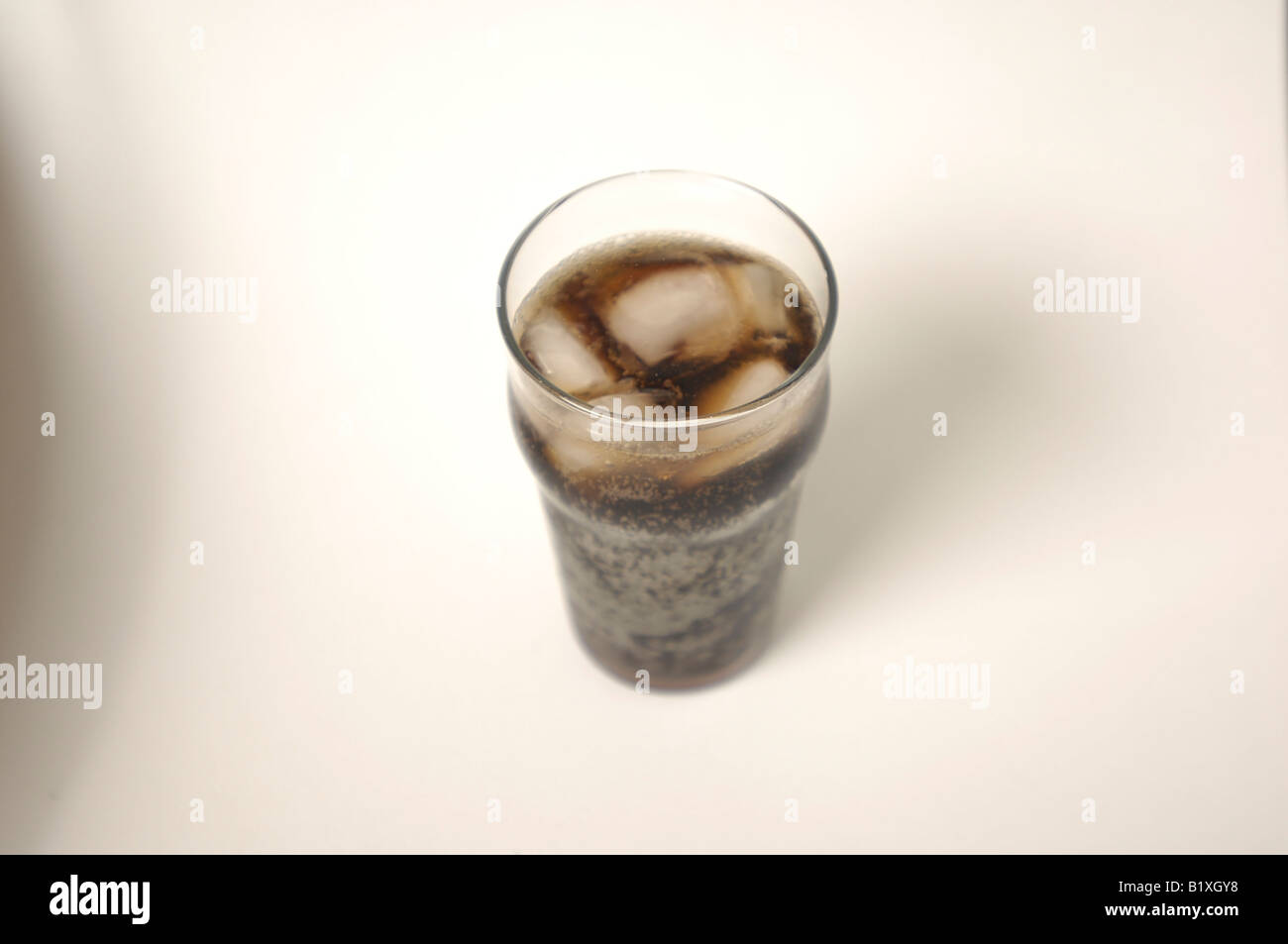 A tall pint glass full of Coke, Pepsi, Diet Soda, or other Cola Stock Photo