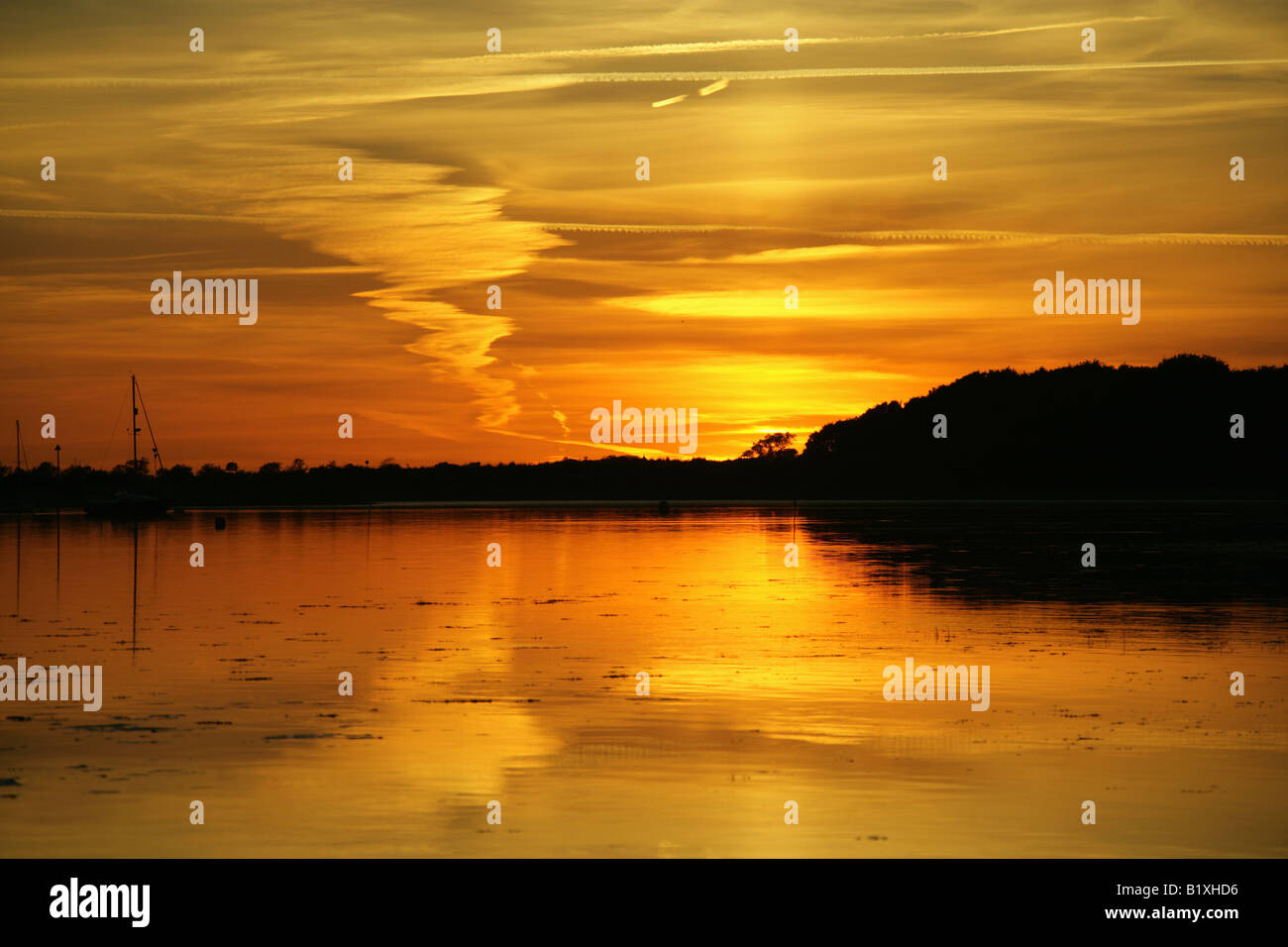 Town of Emsworth, England. Dramatic sunset over the River Ems, viewed