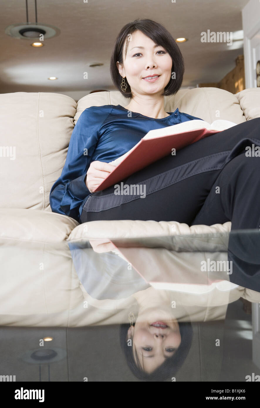 Portrait of a mid adult woman holding a document Stock Photo