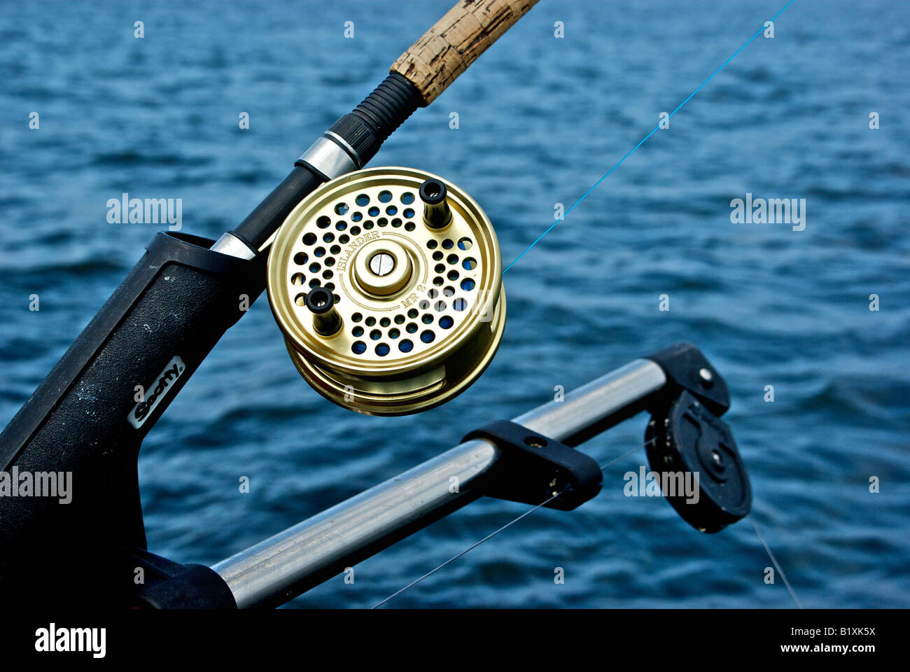 Single action Islander MR2 fishing reel used with a downrigger to troll for salmon Stock Photo