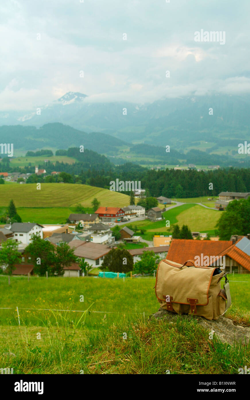 Satchel, and view over Langenegg village, district of Bregenzerwald, Vorarlberg region, Austria Stock Photo