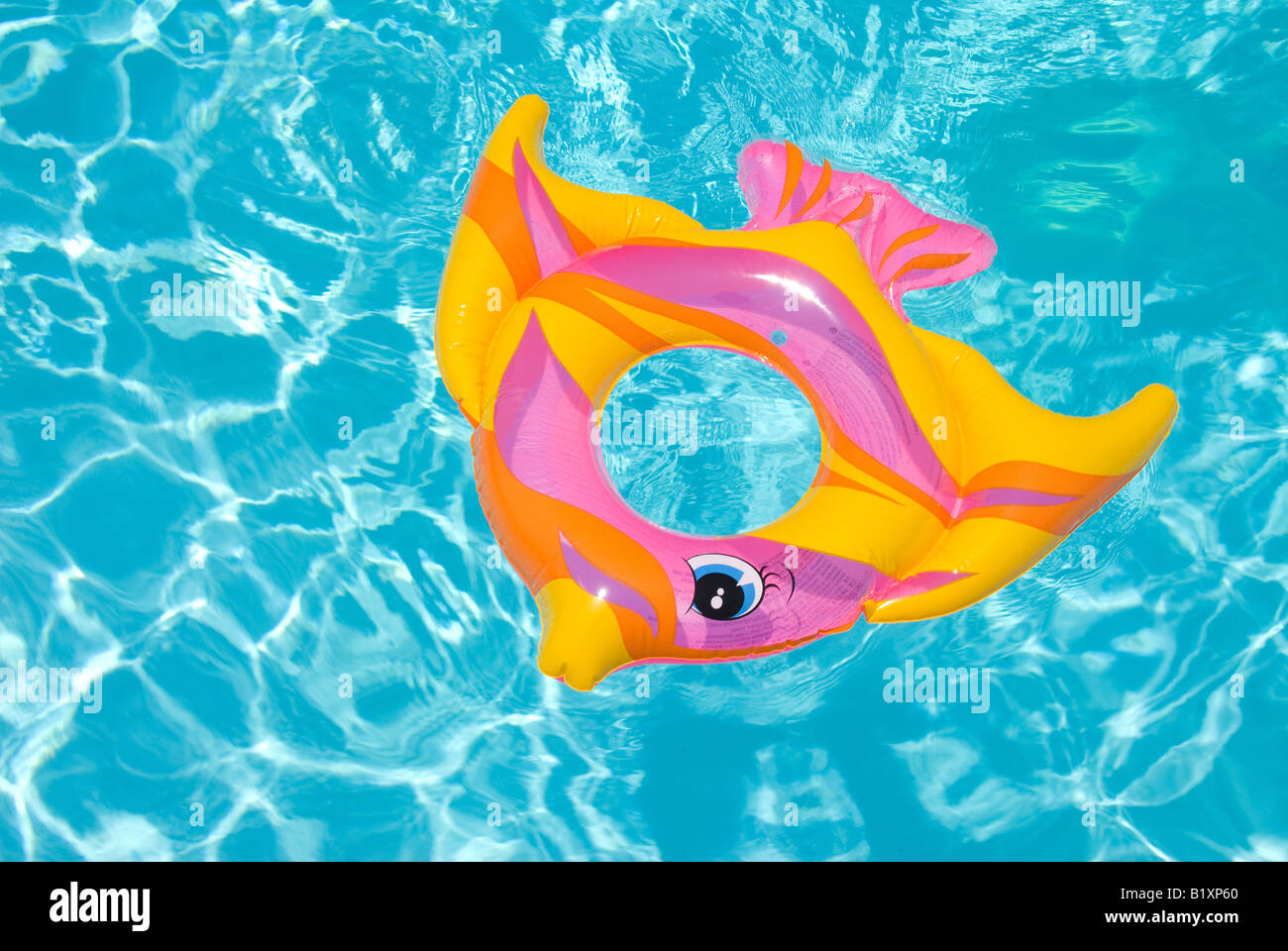 A safety float drifts in a swimming pool Stock Photo Alamy