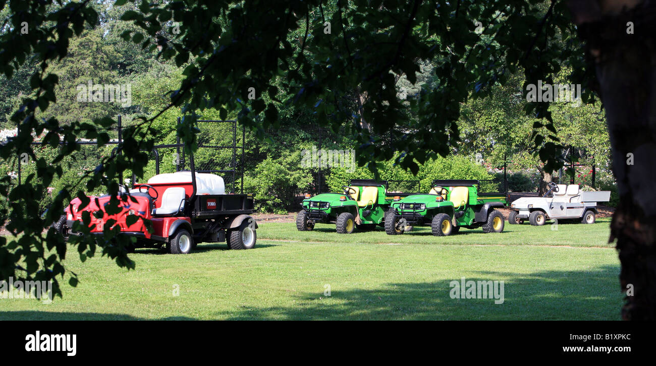 Garden utility vehicles parked in a row Stock Photo Alamy