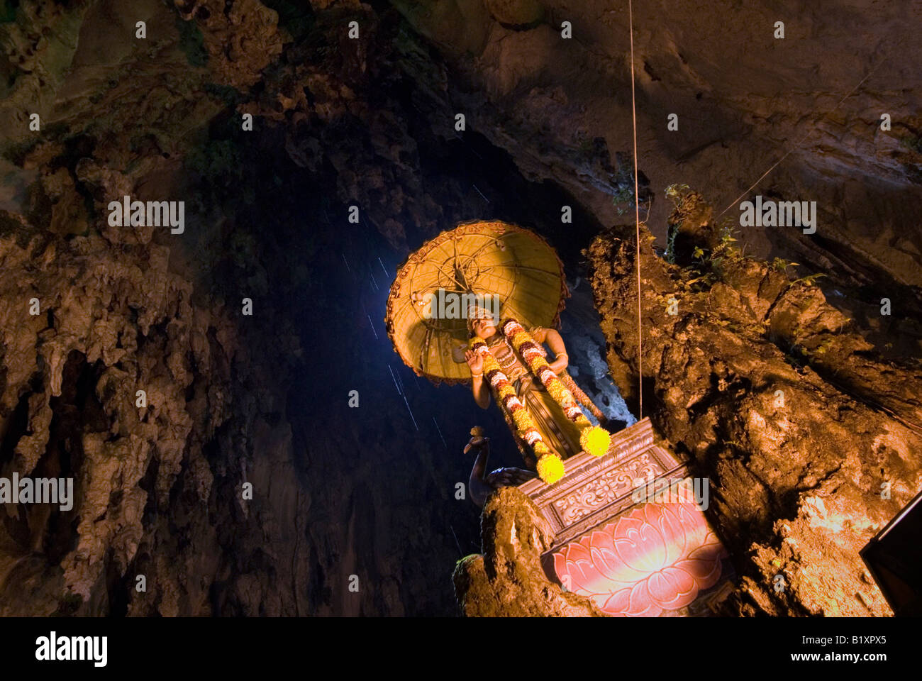 STATUE OF LORD MURUGAN INSIDE THE BATU CAVE DURING THE ANNUAL HINDU FESTIVAL OF THAIPUSAM KUALA LUMPUR MALAYSIA Stock Photo