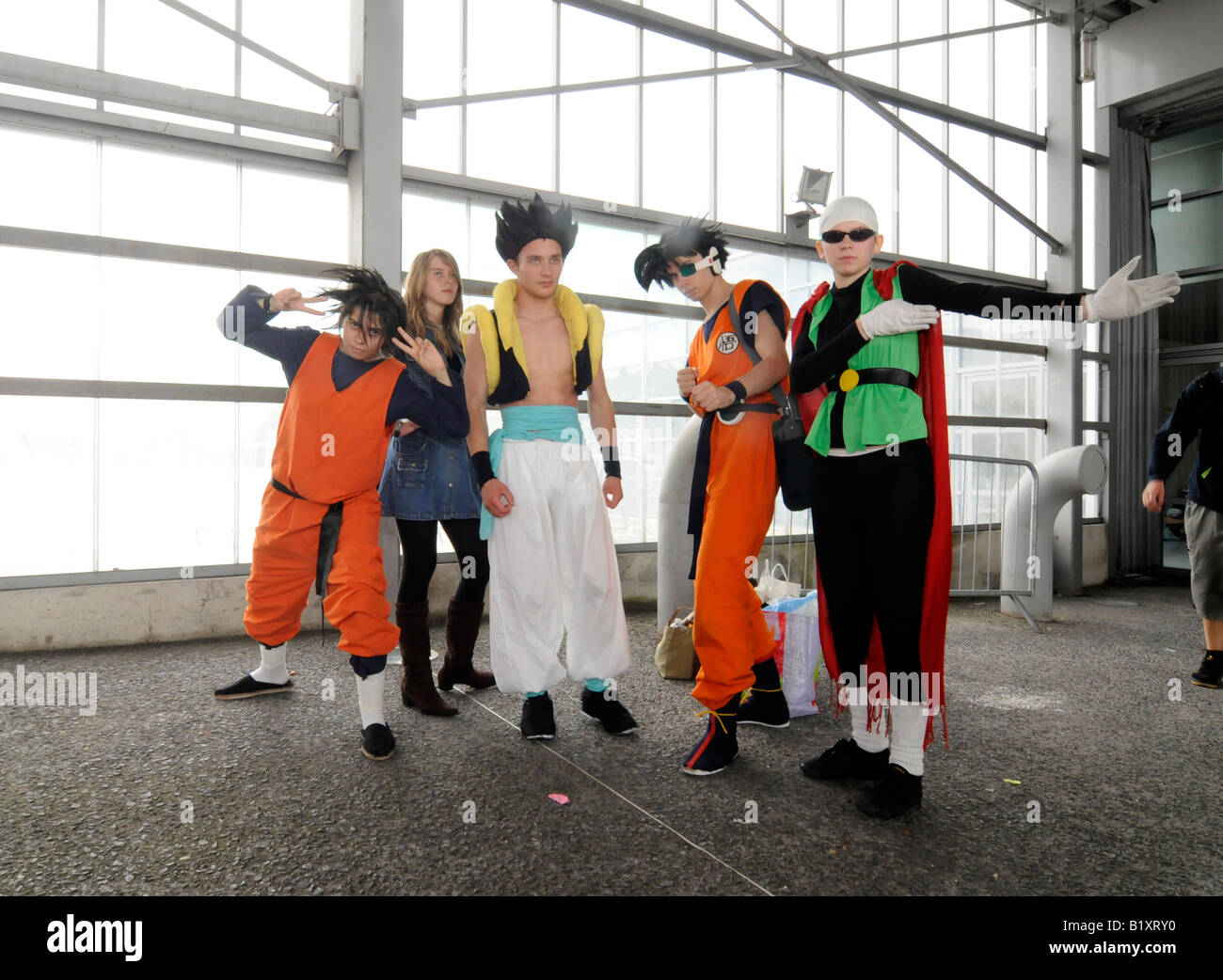 Fans of the Japanese manga 'Dragon Ball' dressing up as their heroes during a cosplay event at the Japan Expo exhibition fair. Stock Photo