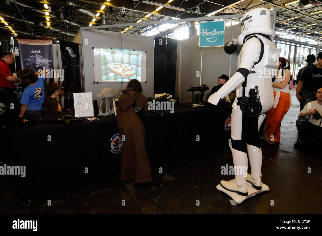 A man dressed as a Starwars trooper playing the Nintendo Wii fitness game during the Japan Expo exhibition fair. Stock Photo