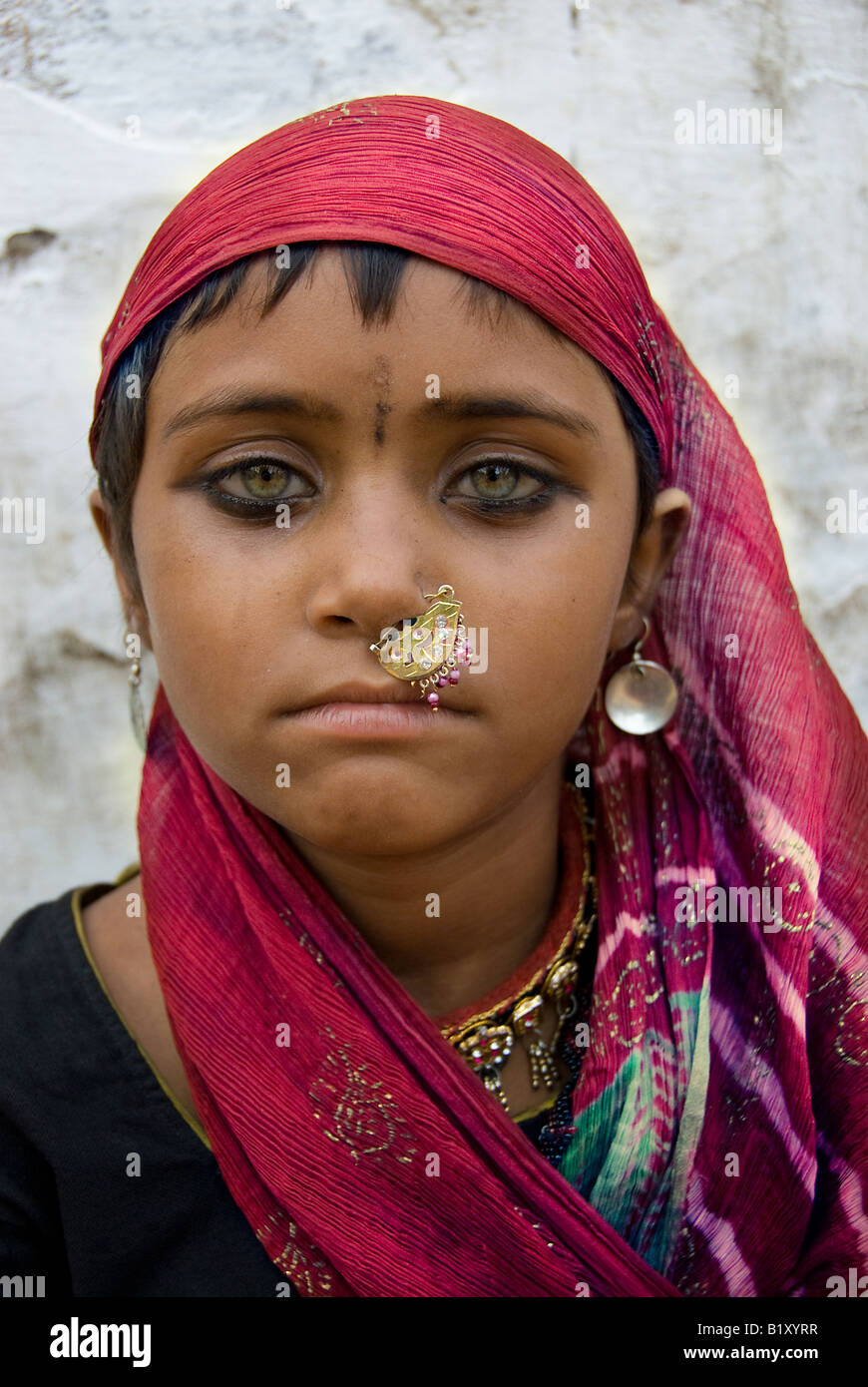 Portrait of a Rajasthani girl from the Bhopa tribe, Thar desert, Rajasthan, India. Stock Photo