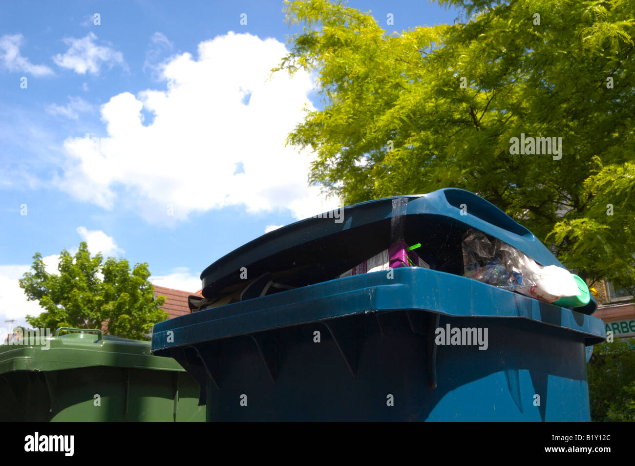 Recycling and waste bins on a street in Harrow, London, UK 3/3 Stock