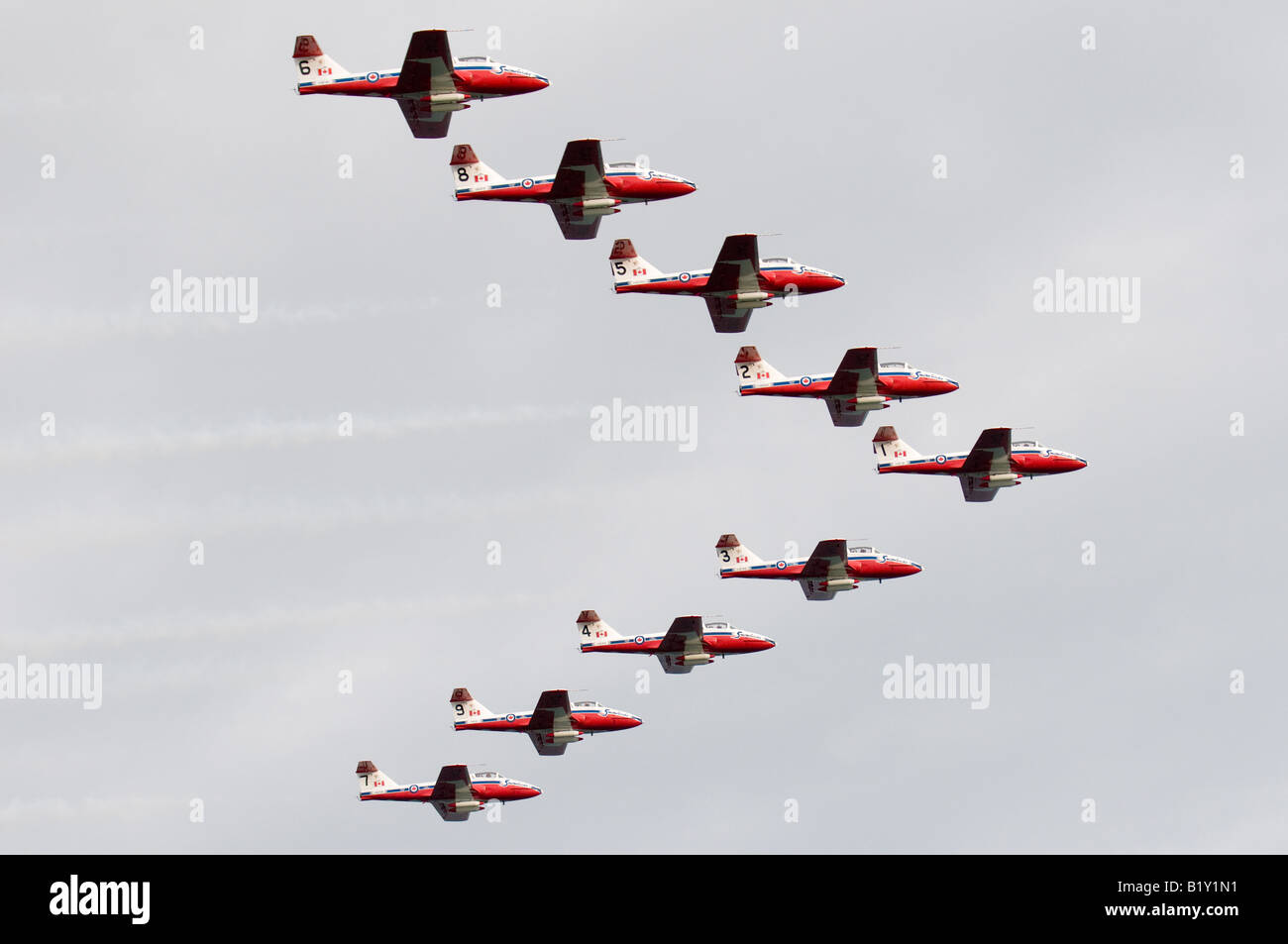 The Snowbirds, Canada's extreme aerobatic team, perform precise maneuvers together in the sky. Stock Photo