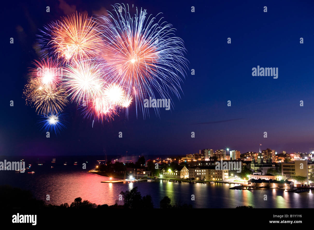 Fireworks illuminate the skyline during Canada Day Festivities on July 1st 2008 in Kingston, Ontario, Canada. Stock Photo