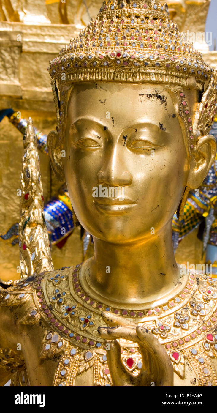 Kinnara half-human mythological gold figure Grand Palace Bangkok Thailand Stock Photo