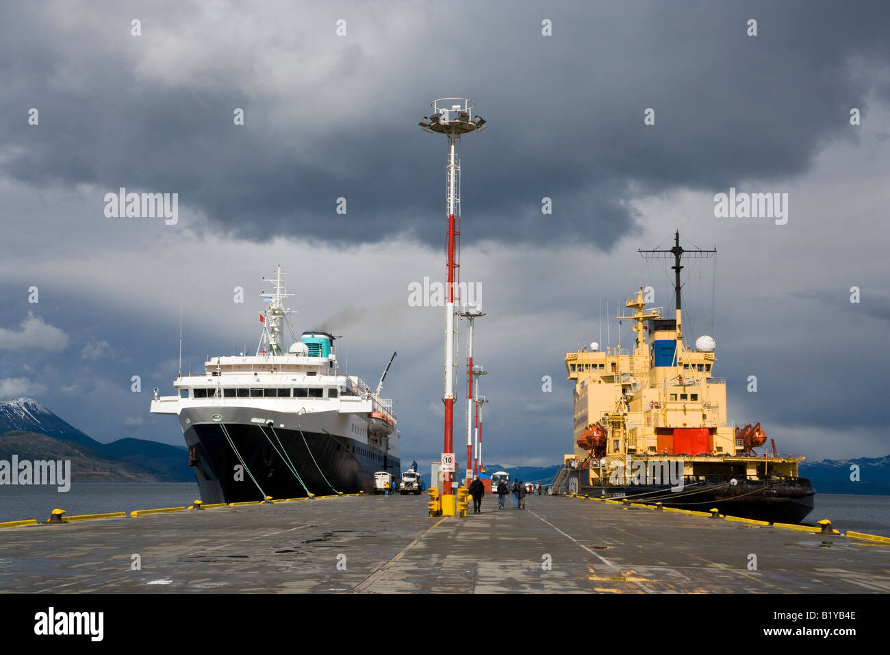 2 Antarctic cruise ships Russian Icebreaker and Explorer II  boarding passengers for Antarctica adventure vacation cruise at dock Ushuaia, Argentina Stock Photo