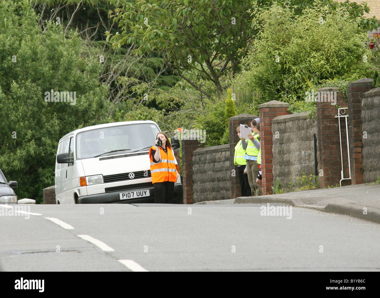 Speed camera checking for speeding vehicles on a public road in the