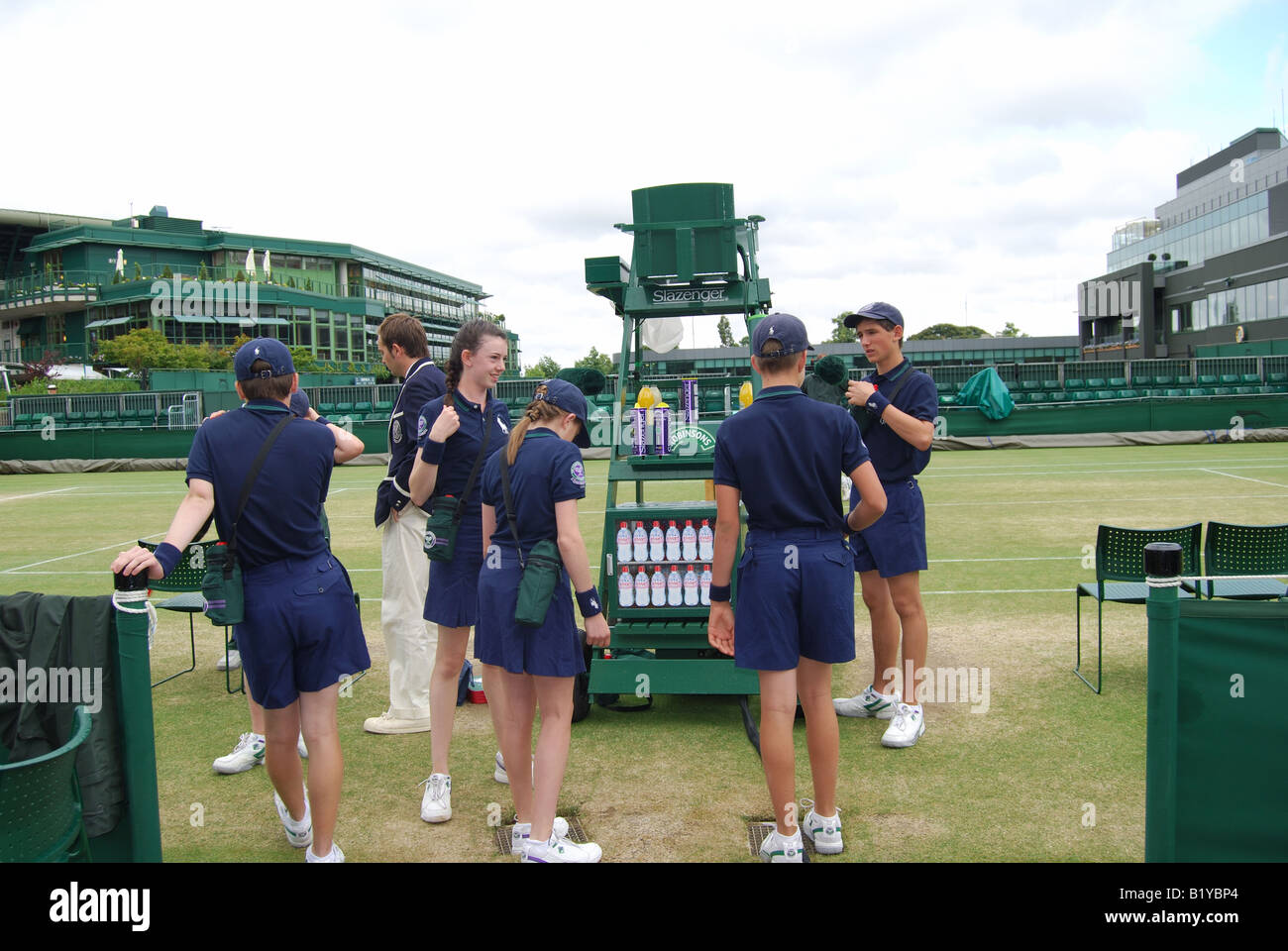 Ball boys and girls on outside court, The Championships, Wimbledon, Merton Borough, Greater London, England, United Kingdom Stock Photo