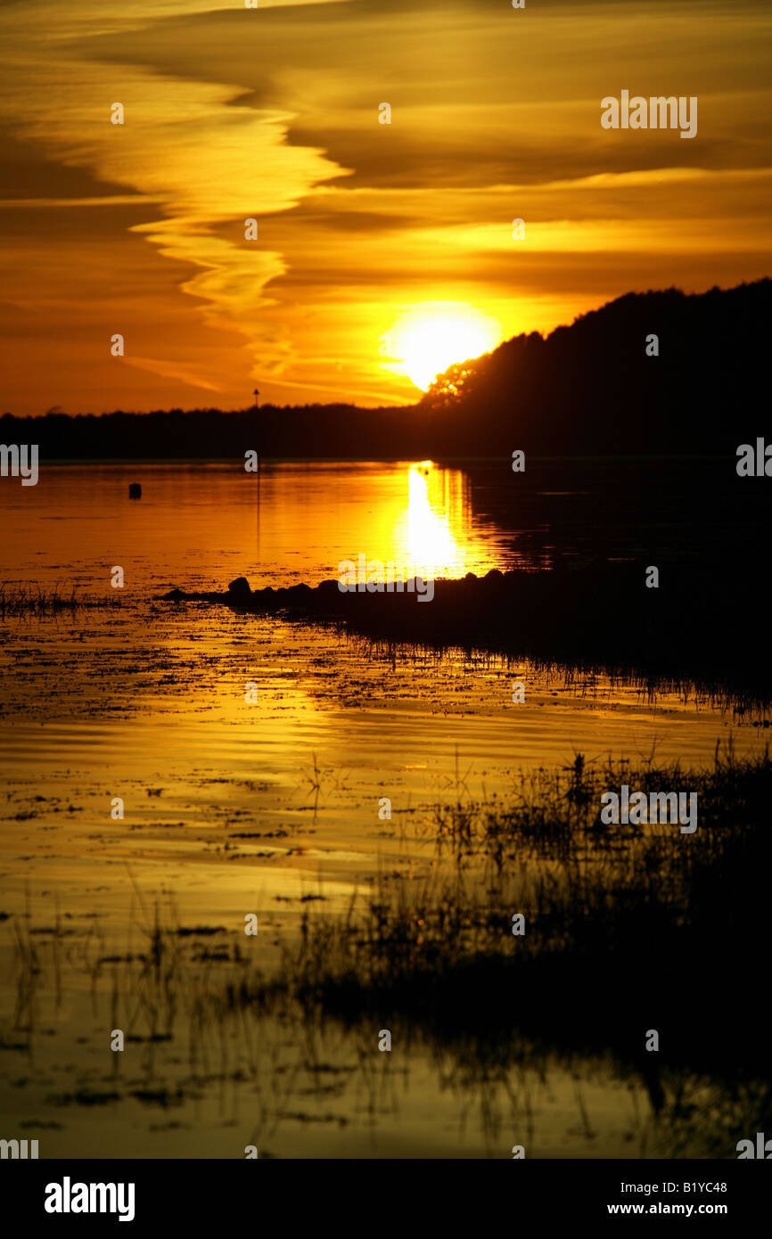 Town of Emsworth, England. Dramatic sunset over the River Ems, viewed