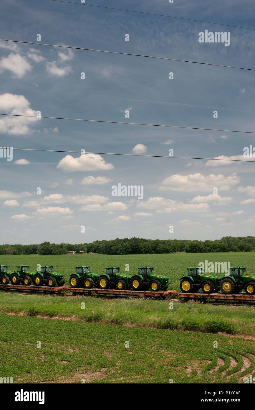 John Deere farm tractors on rail cars near Waterloo Iowa location of