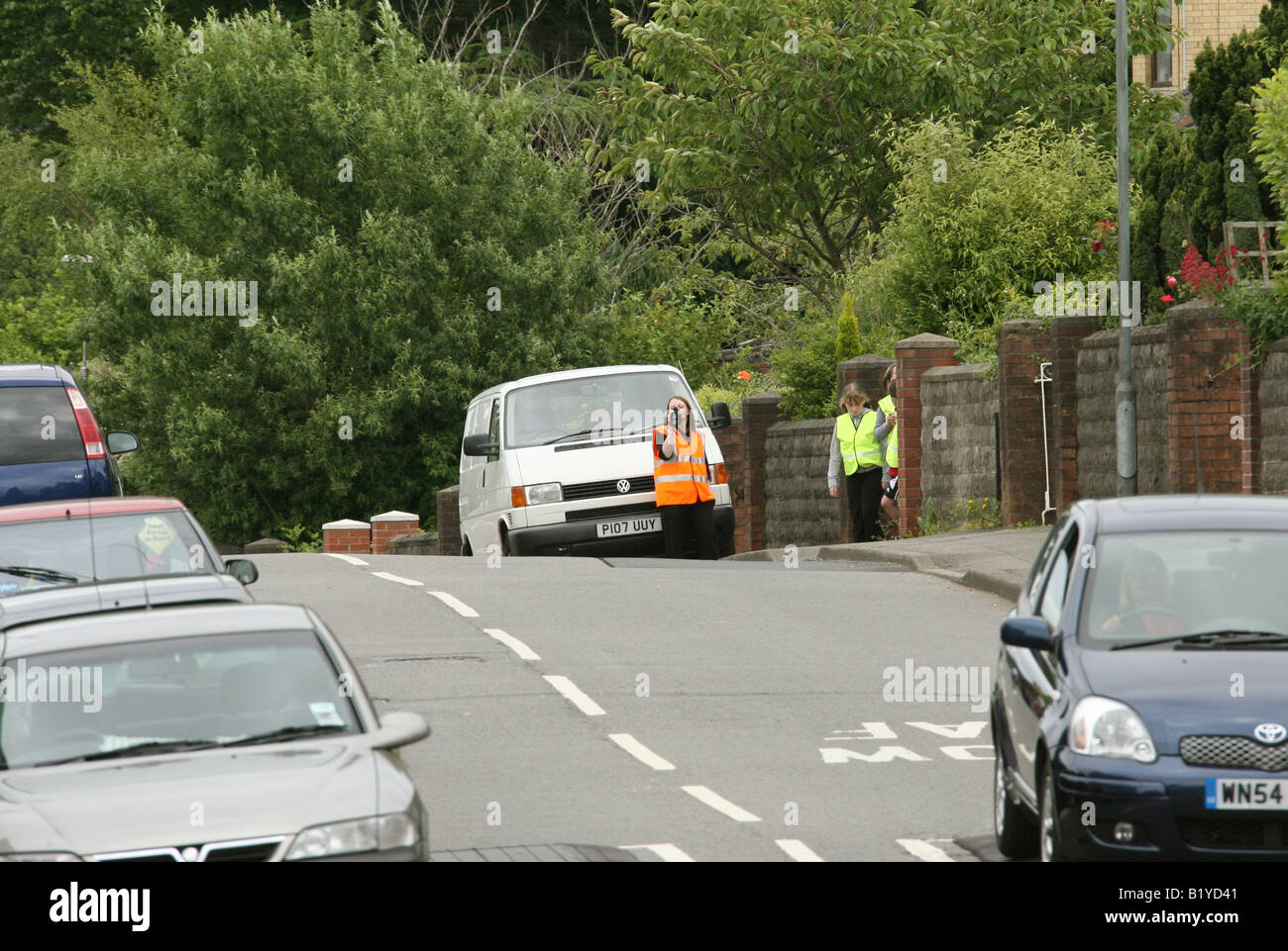 Speed camera checking for speeding vehicles on a public road in the