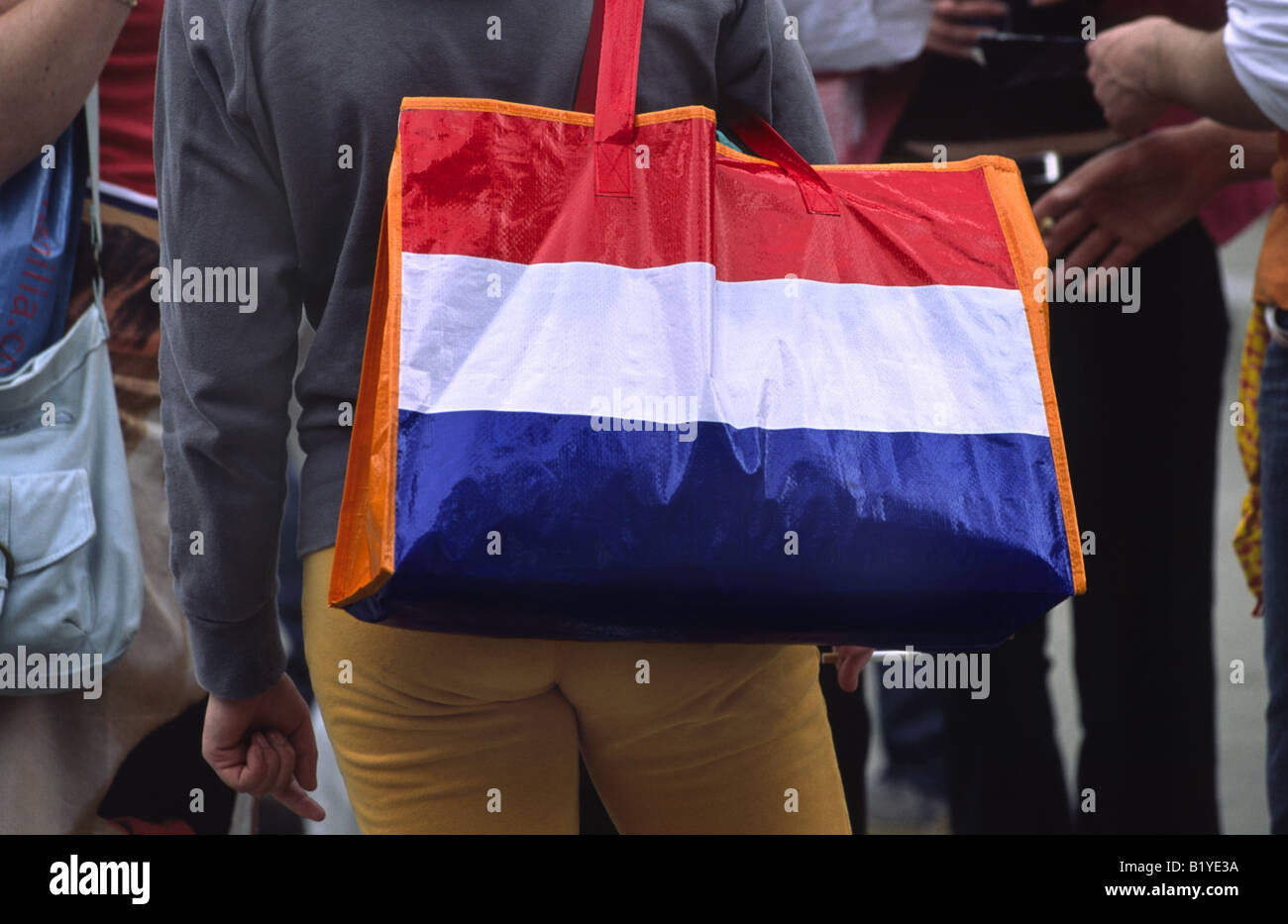 Dutch flag bag during Queen's Day Celebrations. Amsterdam, Netherlands. Stock Photo