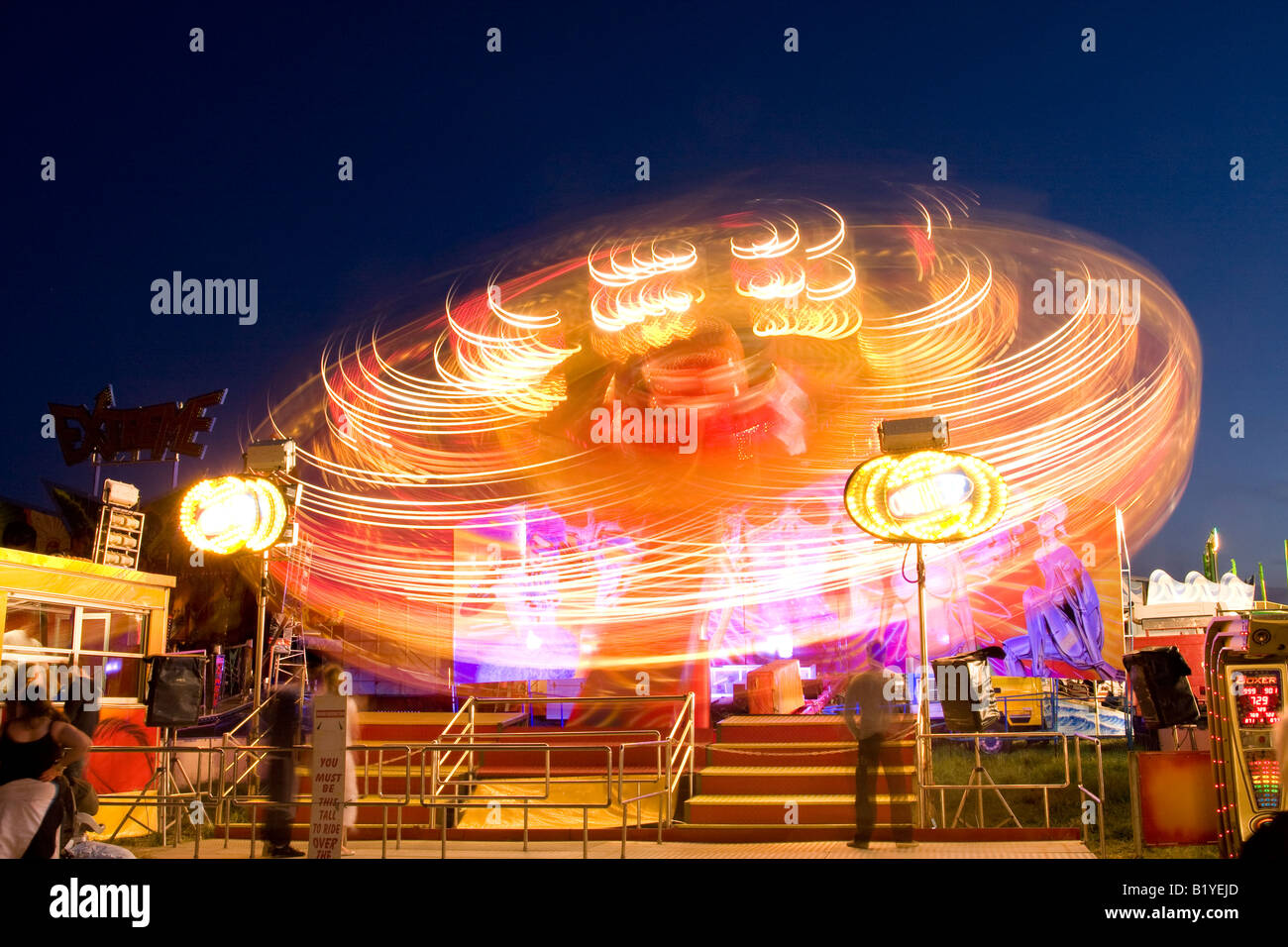 A fairground ride night shot at the Hoppings fair on the town moor newcastle Stock Photo