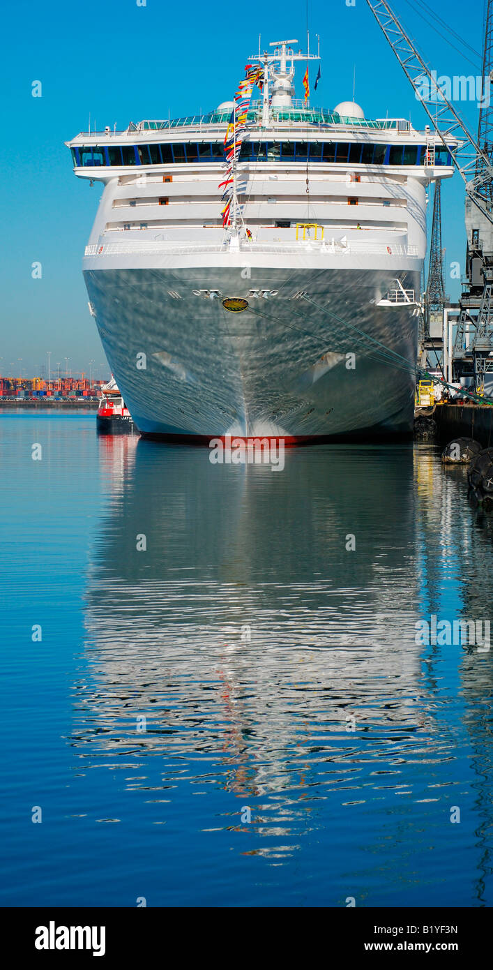 cruise ship oceana against quayside with reflections on hull of water Stock Photo