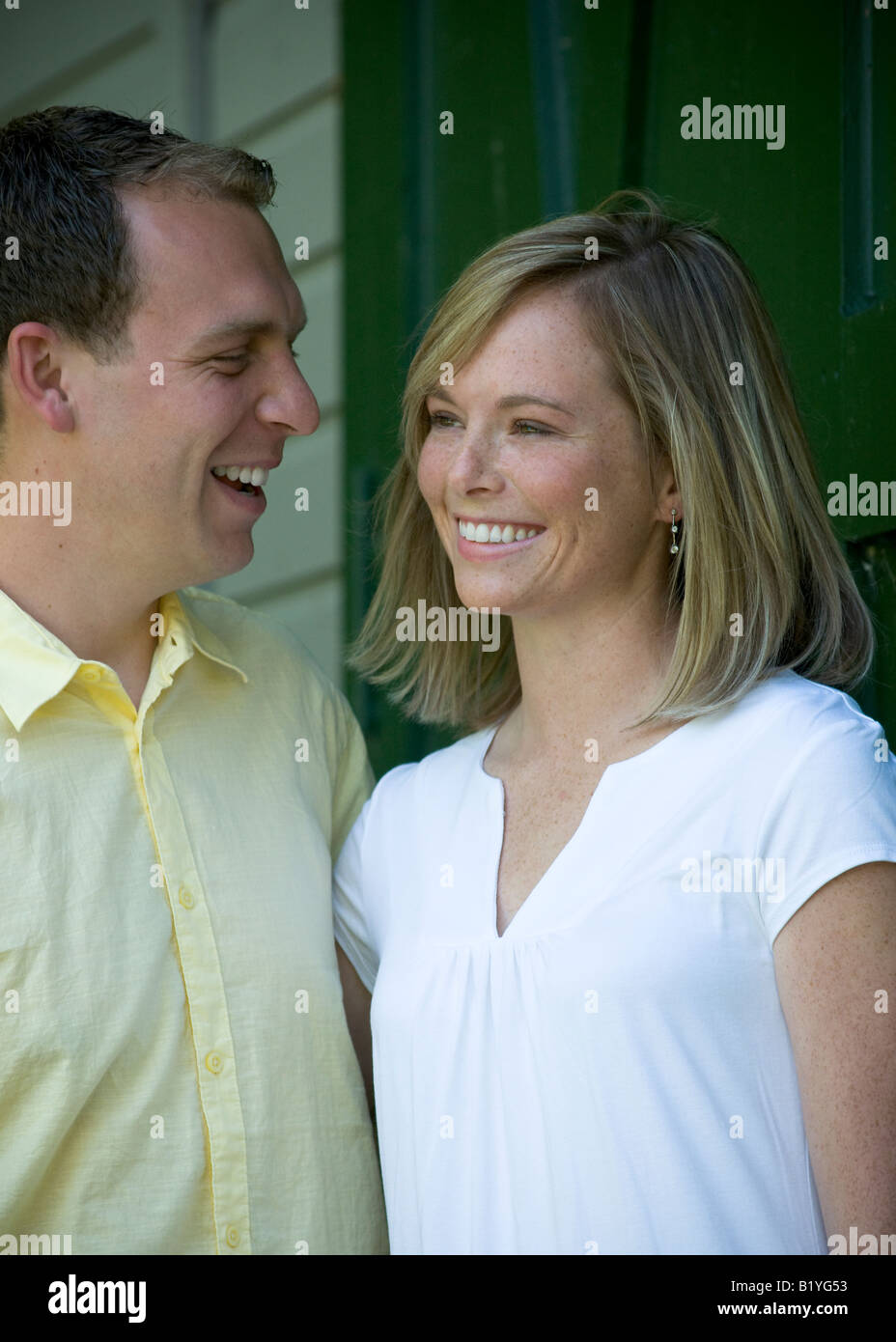 Man and woman in front of barn hi-res stock photography and images - Alamy