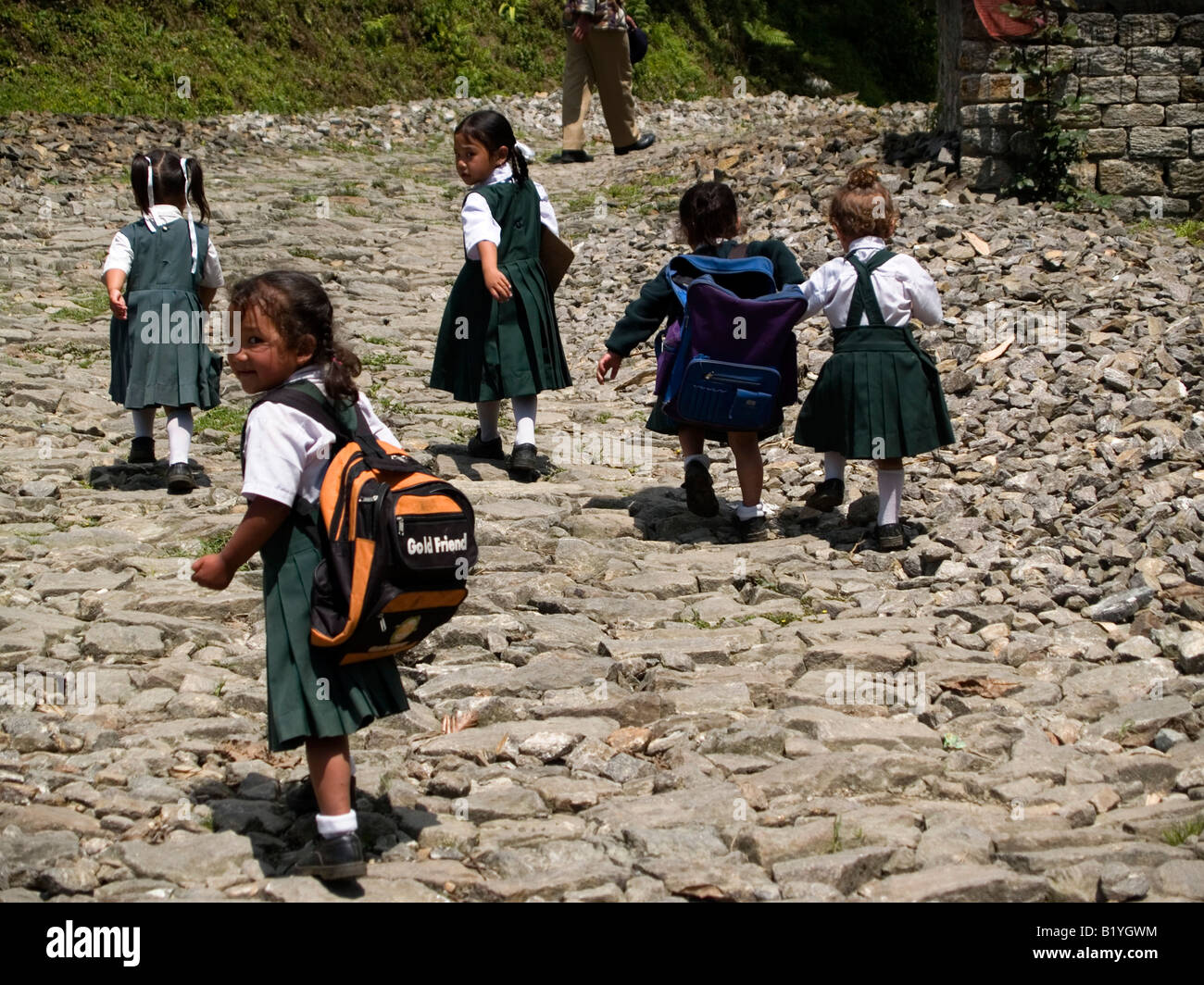 cute schoolgirls on the way to class in Sikkim India Stock Photo