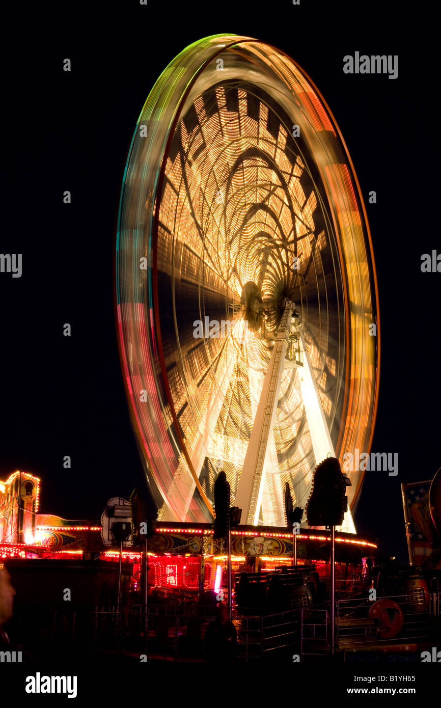 Fairground at night big wheel hires stock photography and images Alamy