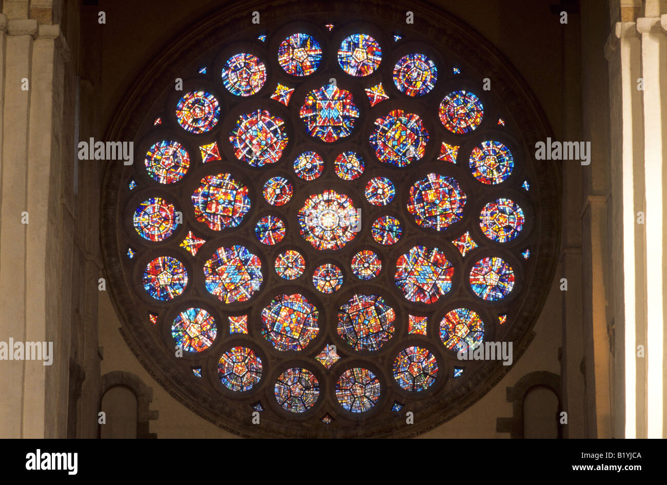 St Albans Cathedral interior north transept rose window modern stained glass Herfordshire England UK circular round Stock Photo