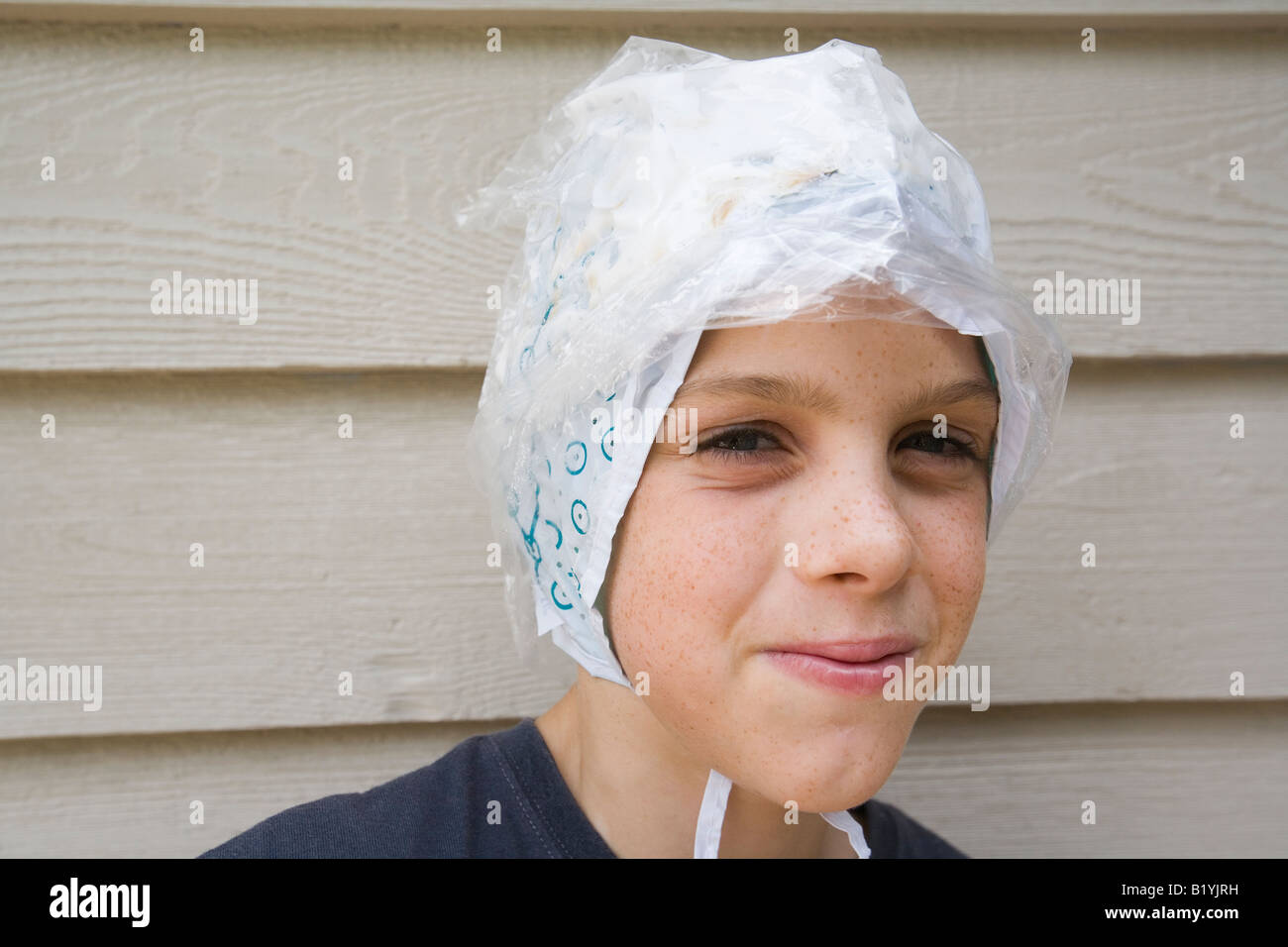 Portrait of boy looking at camera smiling Stock Photo - Alamy