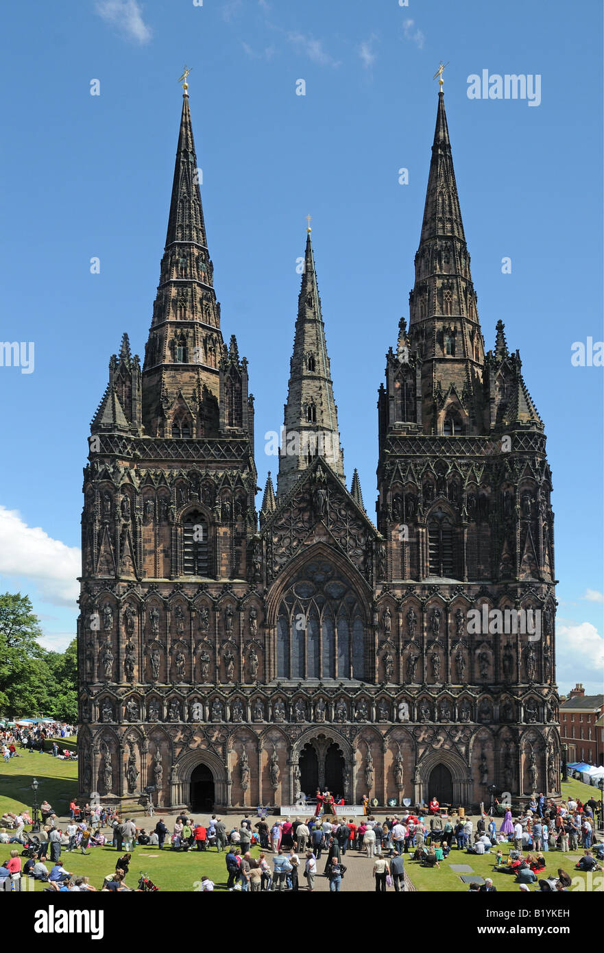 Lichfield Cathedral with the Mediaeval Market during the annual Lichfield Music Festival Lichfield Staffordshire England Stock Photo
