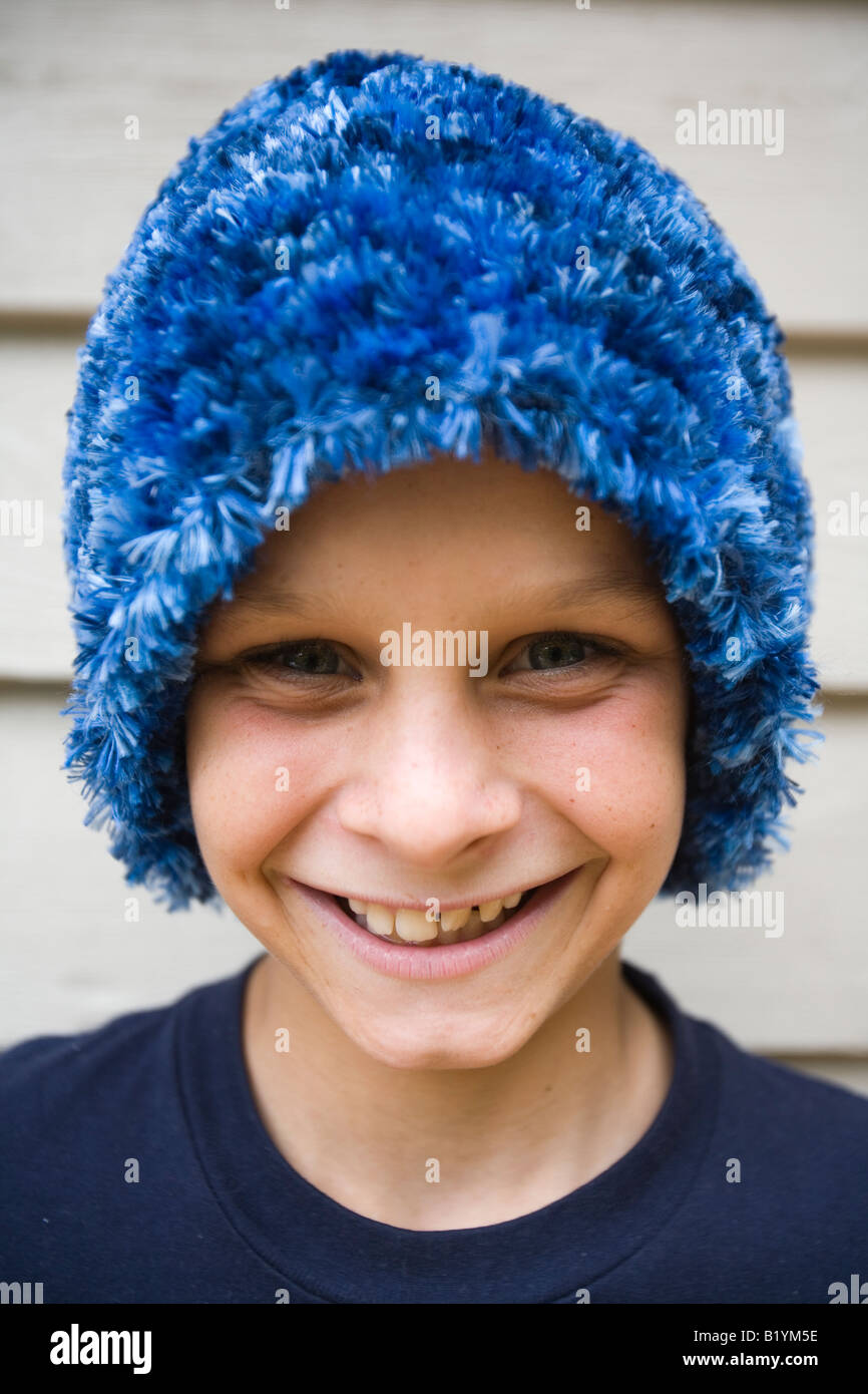 Portrait of a boy looking at camera smiling with funny hat Stock Photo ...