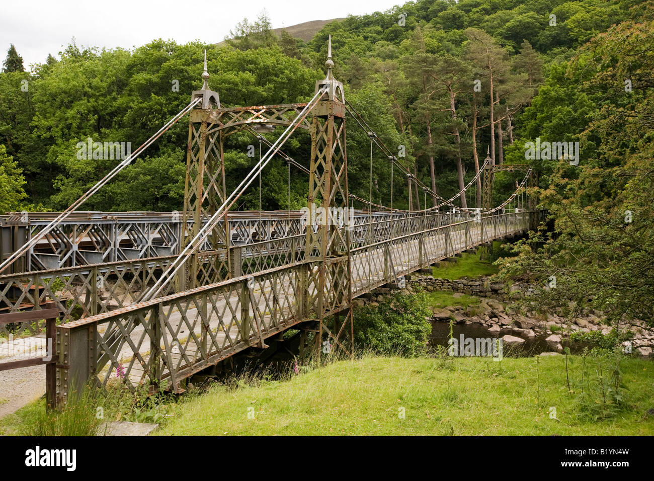 UK Wales Powys Rhayader Elan Valley old cast iron bridge over River Elan Stock Photo
