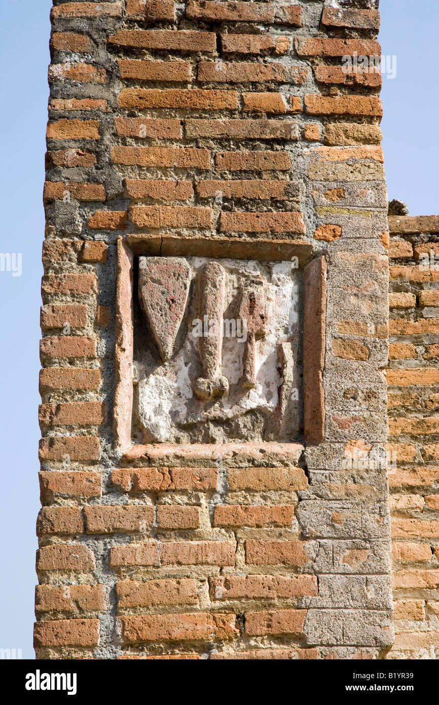 Sign showing workman s business Pompeii Campania Italy Stock Photo