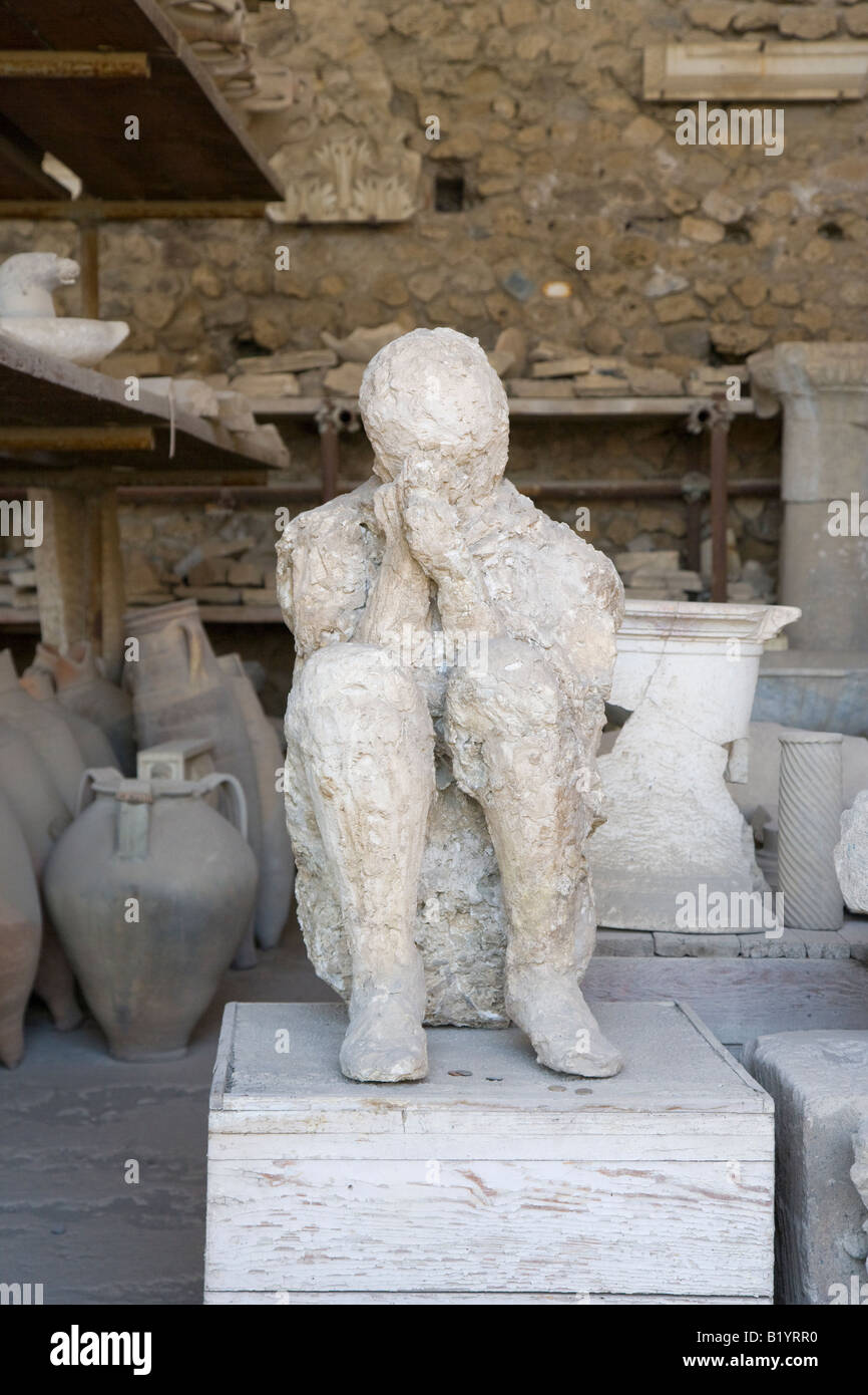 Plaster casts of the victims of the Vesuvius eruption in the Forum Granary  Pompeii Campani Italy Stock Photo - Alamy
